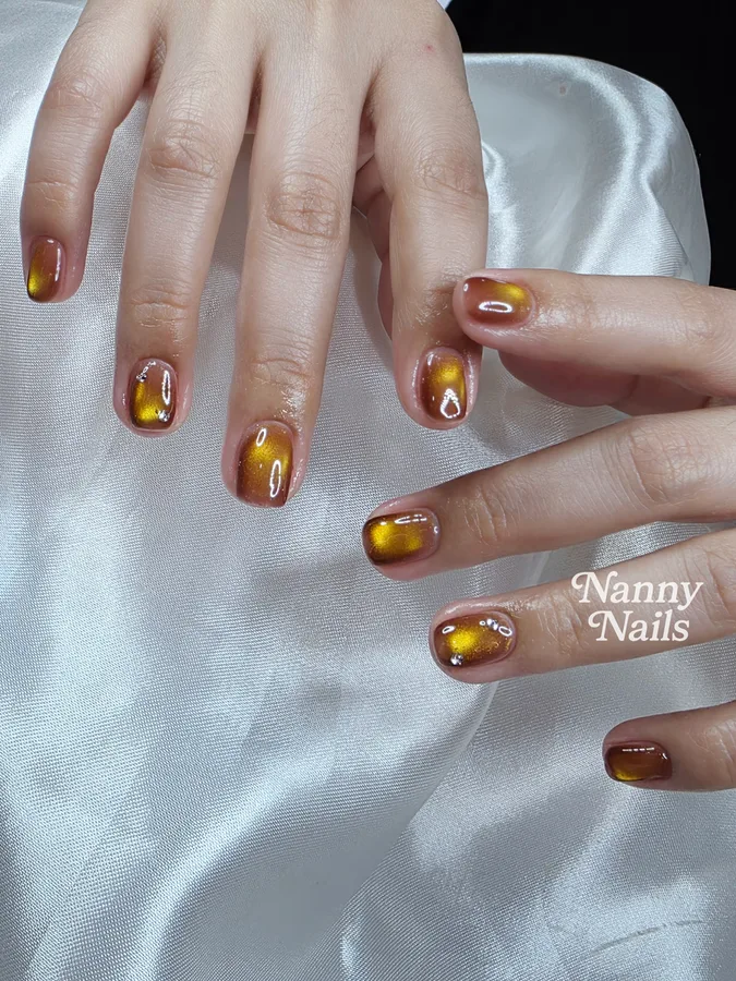 เล็บตรุษจีน 2570 ลูกแก้วสีทองอำพัน ร้านทำเล็บนครพนม Nanny Nails