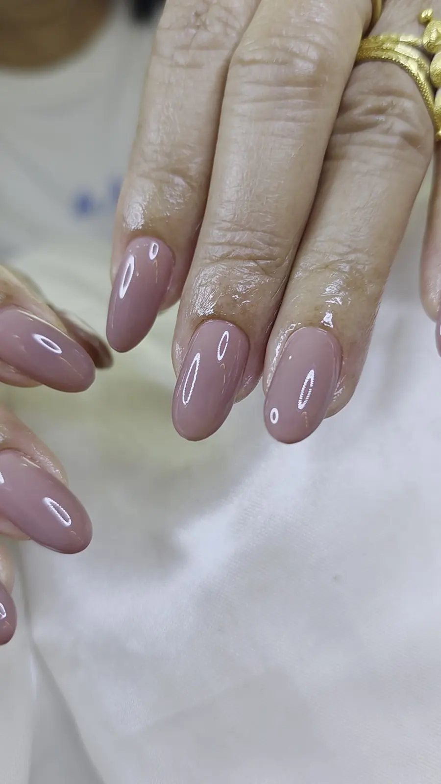 Nude mauve gel nails in an almond shape, Nanny Nails, nail salon in Nakhon Phanom