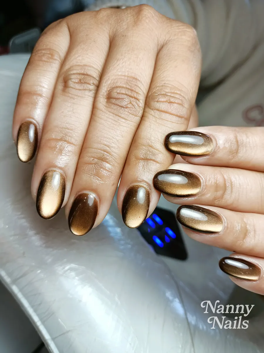 Bronze gold cat eye nails for the Lai Ruea Fai festival, Nanny Nails, nail salon in Nakhon Phanom