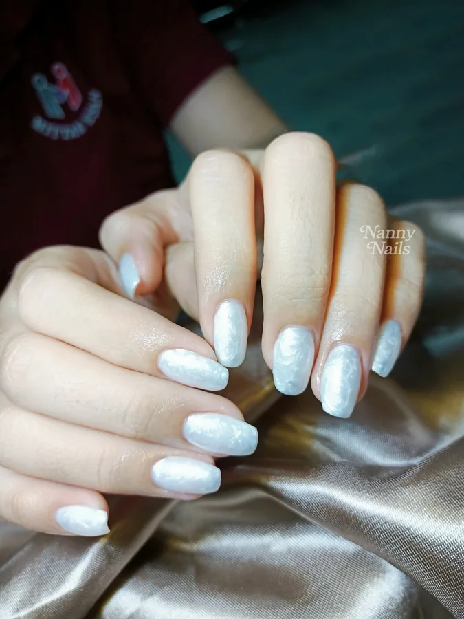 Snow pearl white nails with flash shimmer, Nanny Nails, nail salon in Nakhon Phanom