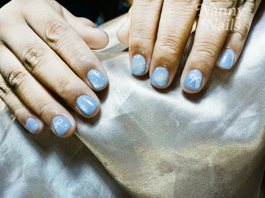 สีเล็บมงคล 2570 คนเกิดวันศุกร์ สีฟ้า เล็บเจลสีฟ้าอ่อน ร้านทำเล็บนครพนม Nanny Nails