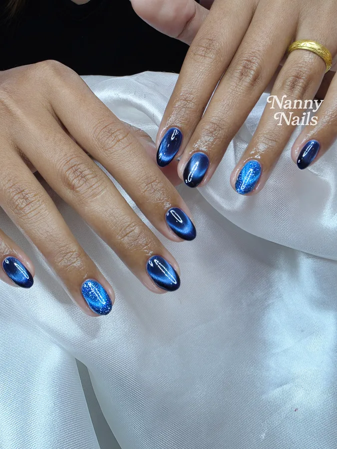 Navy cat eye gel nails, on a female customer, Nanny Nails Nakhon Phanom