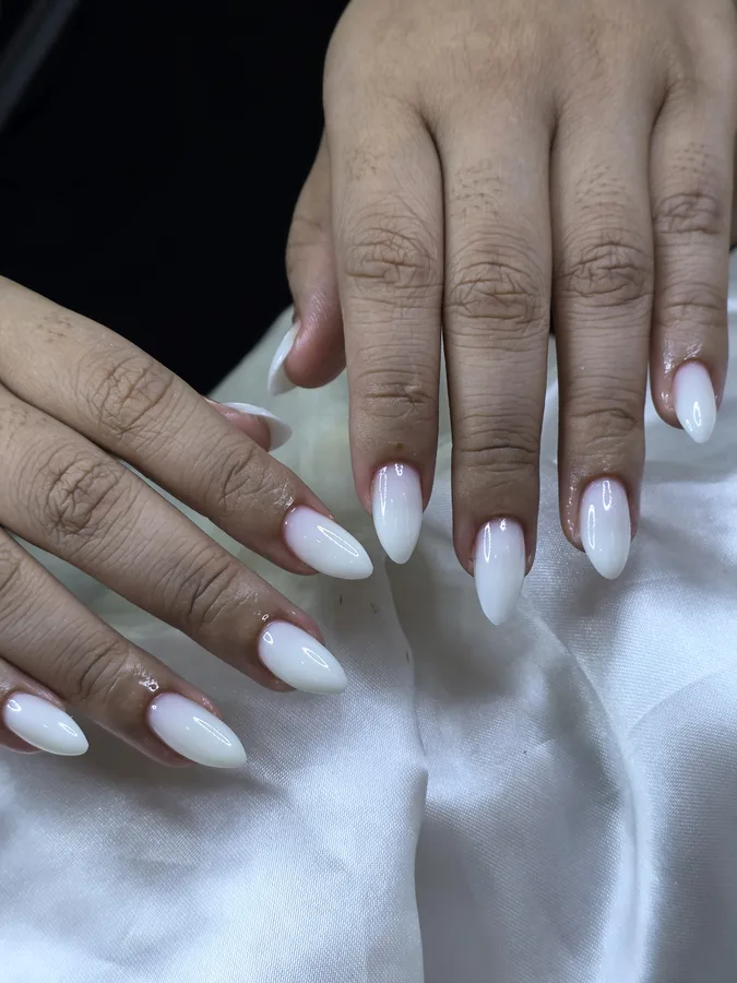 Almond nails in a nude to milky white ombre gel, clear at the base, Nanny Nails Nakhon Phanom