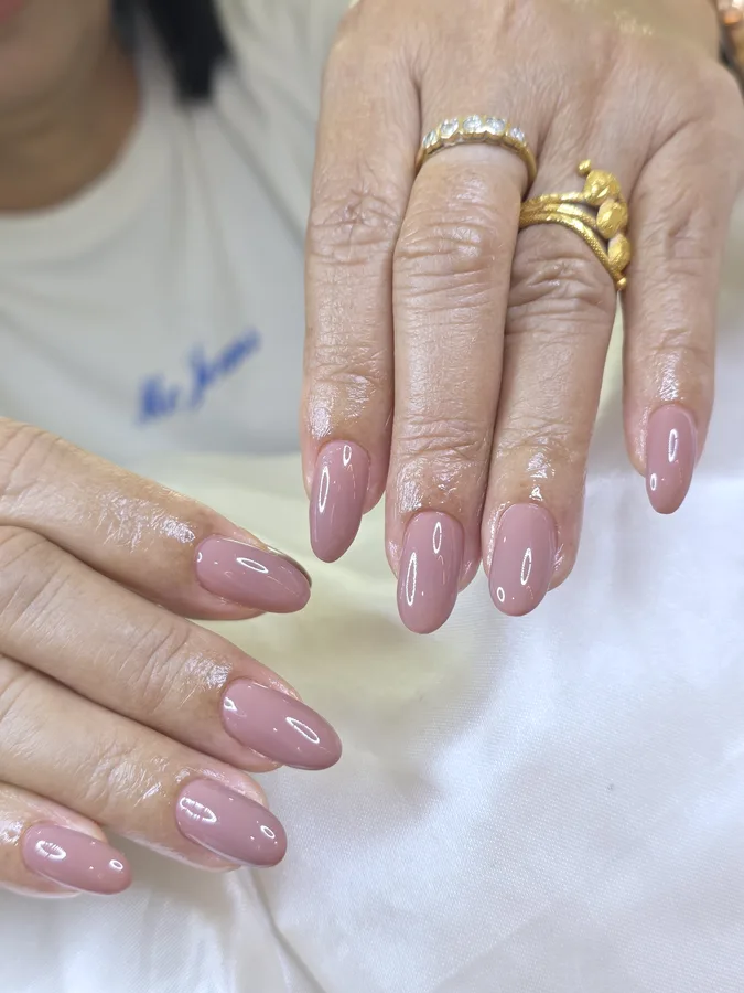 Almond nails in a glossy mauve nude, Nanny Nails Nakhon Phanom