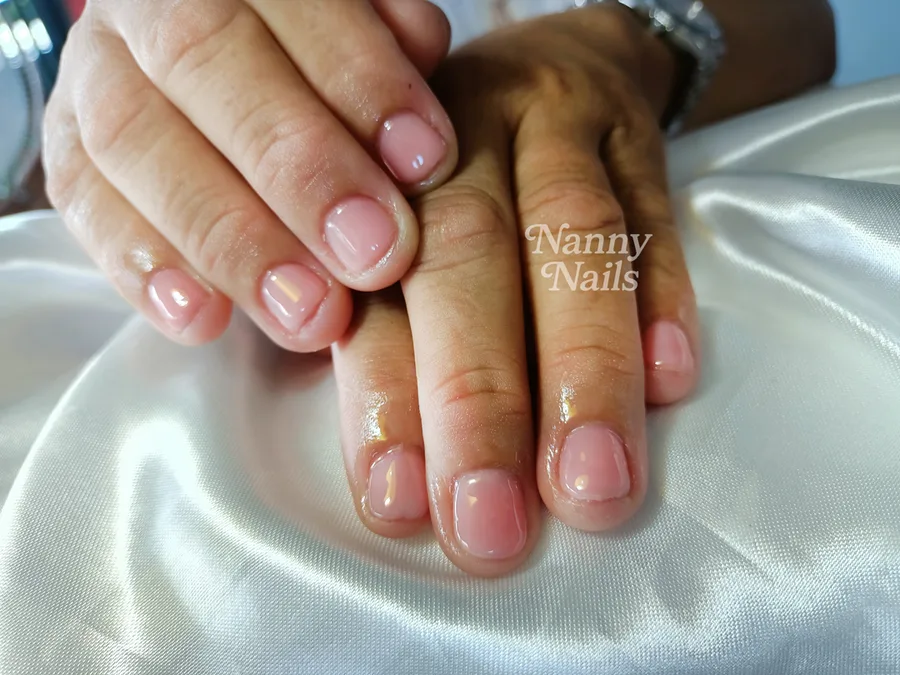 Short round nails in sheer nude pink, Nanny Nails Nakhon Phanom