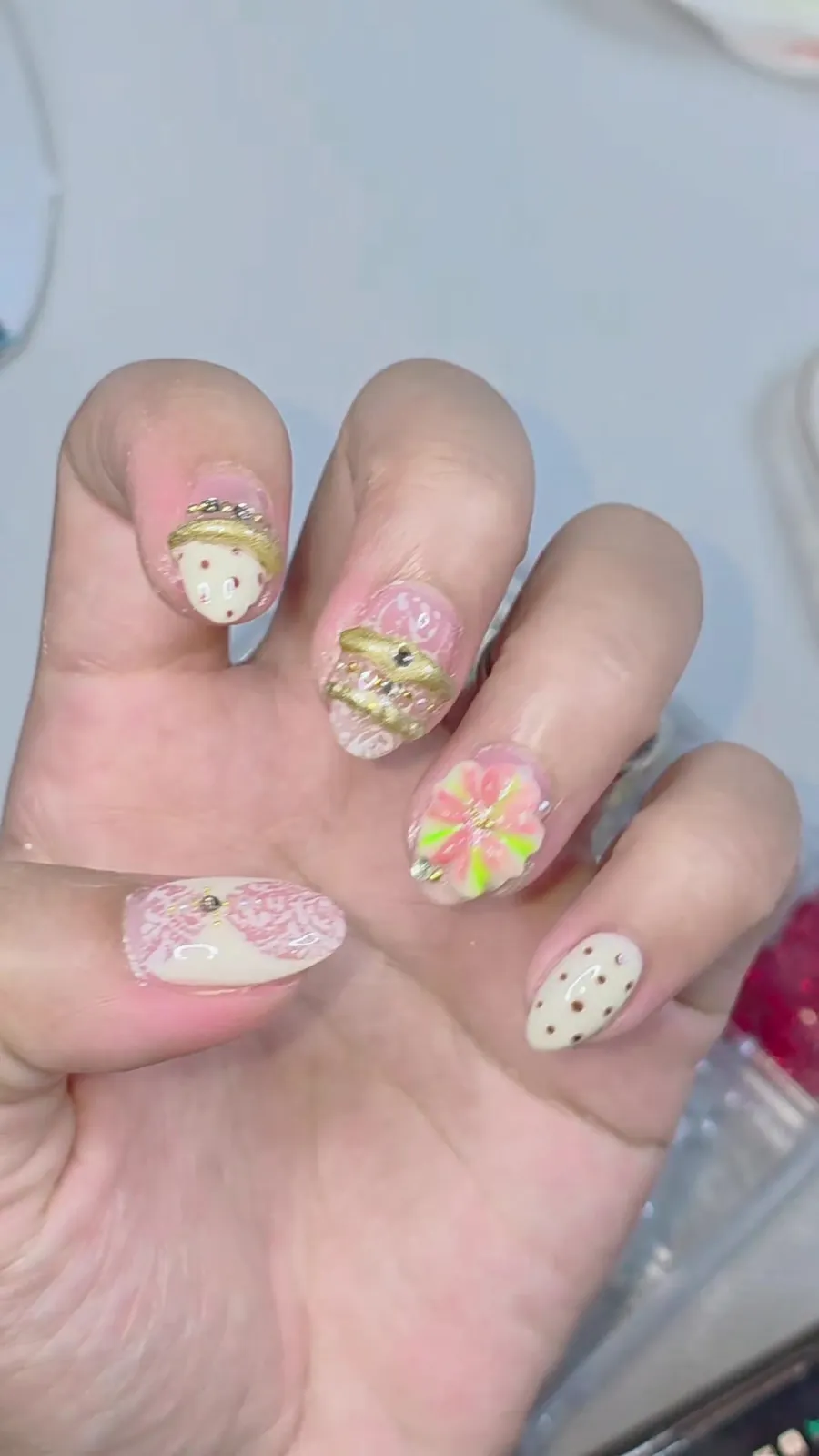 Metallic lace and 3D sculpted nail art in nude and gold, Nanny Nails, nail salon in Nakhon Phanom