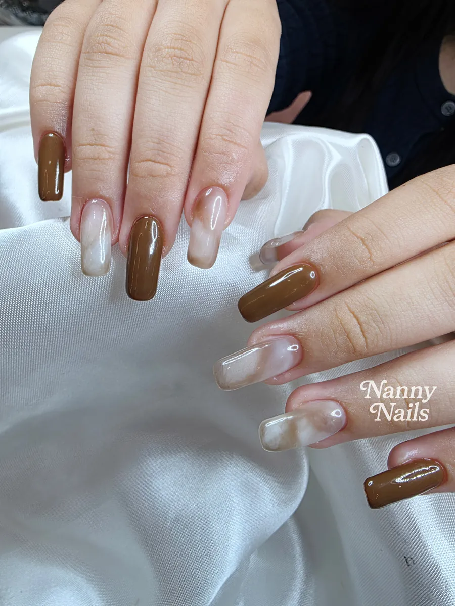 Brown gel nails alternating with milky white marble, Nanny Nails, nail salon in Nakhon Phanom