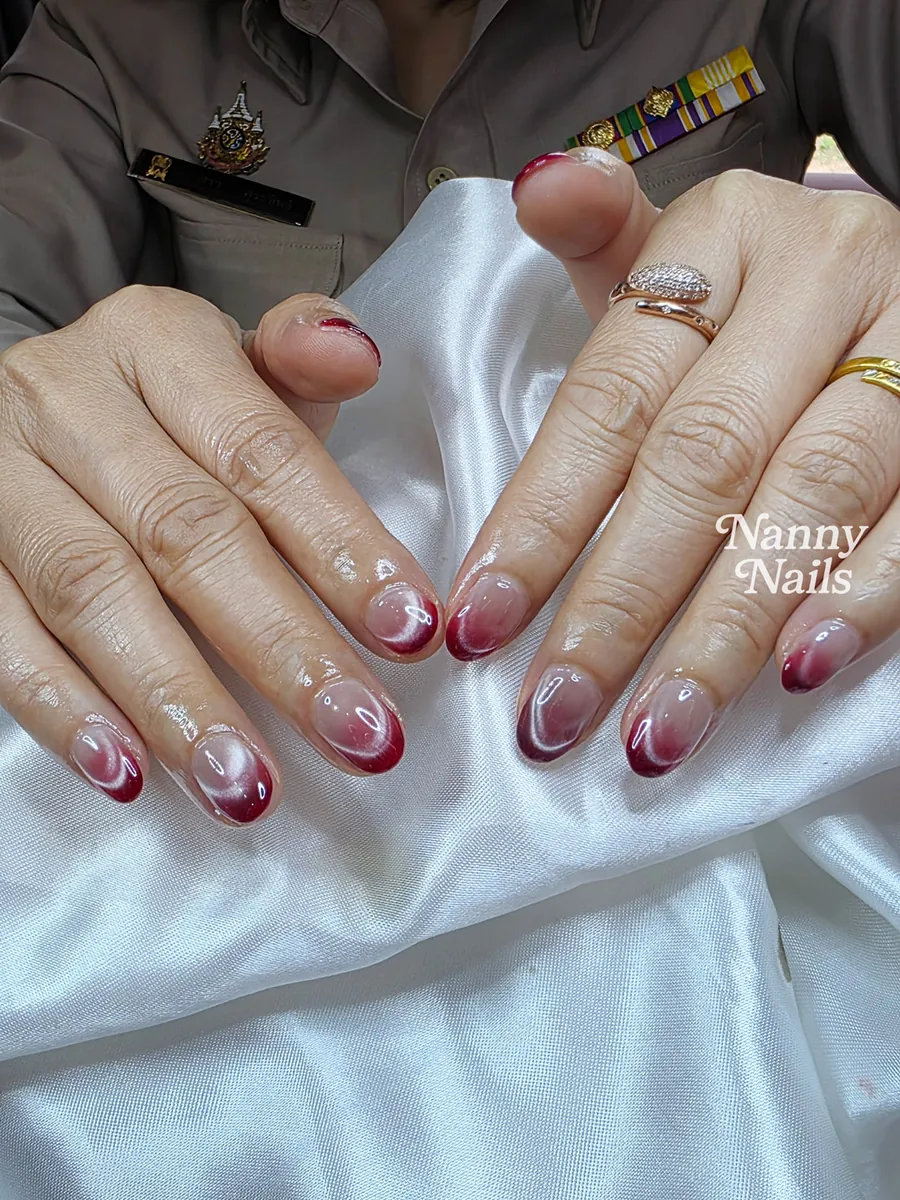 Burgundy fading in at the tips over a nude base, Nanny Nails, nail salon in Nakhon Phanom