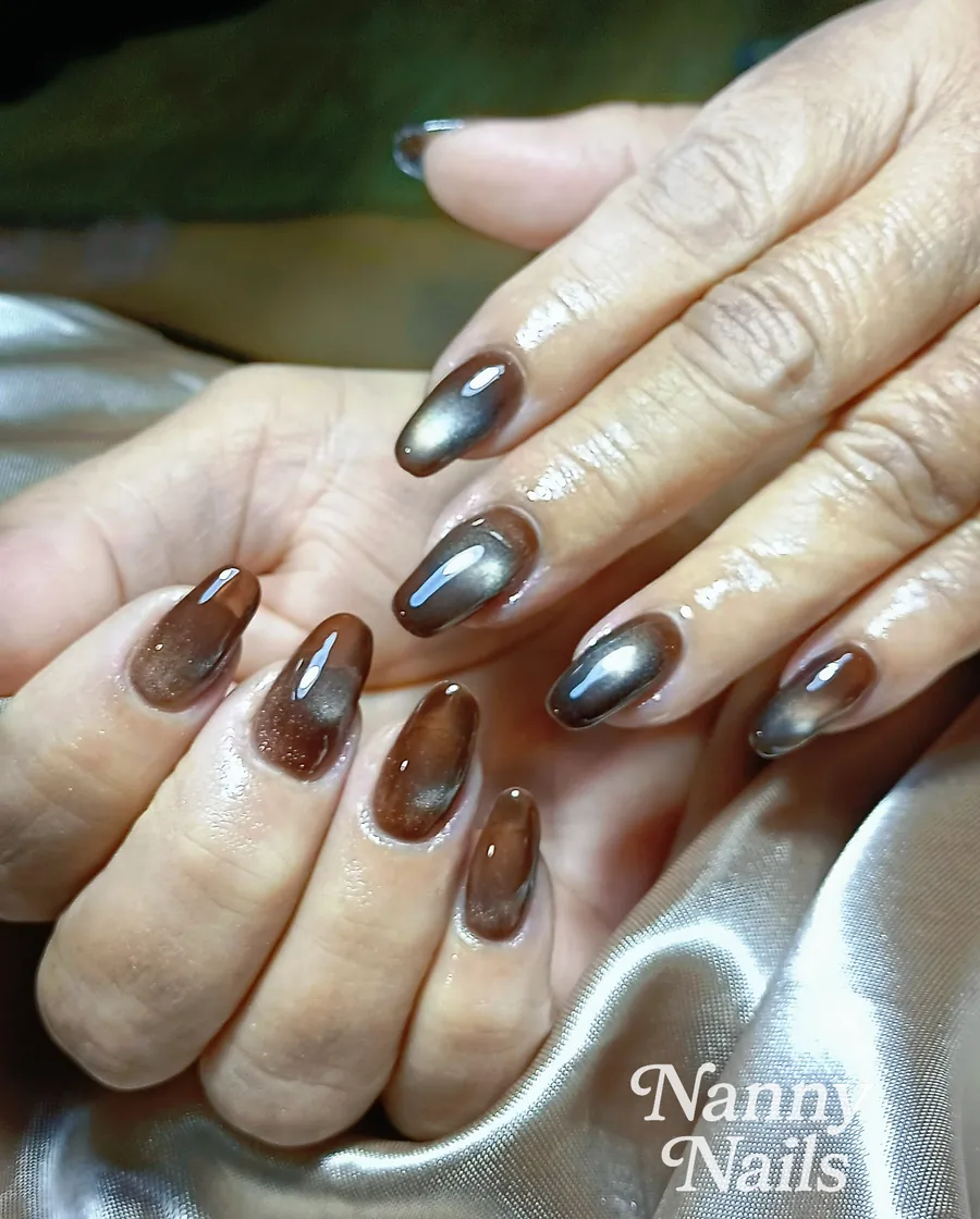 Dark chocolate cat eye gel nails with a soft velvet glow, Nanny Nails, nail salon in Nakhon Phanom