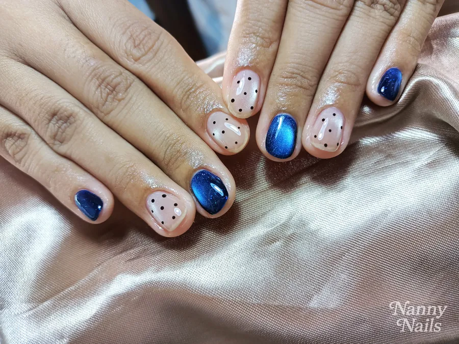 Navy cat eye nails alternating with nude polka dot nails, short, Nanny Nails, nail salon in Nakhon Phanom
