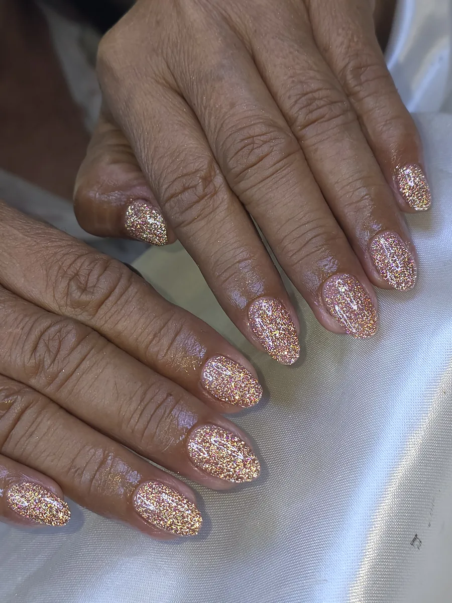 Lucky New Year nails, full gold glitter on almond nails, Nanny Nails, nail salon in Nakhon Phanom