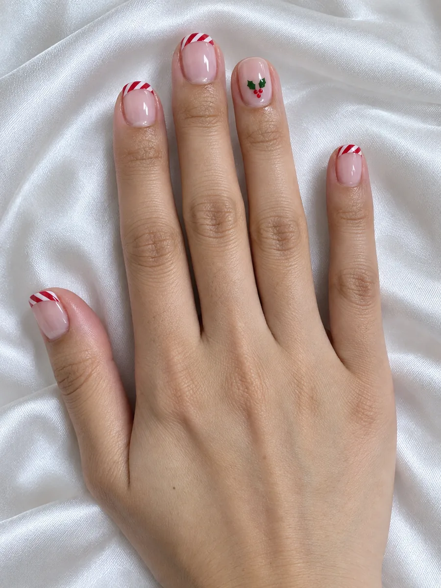 Easy Christmas nail idea, candy cane French tips with holly on short nails, AI image, not salon work, Nanny Nails Nakhon Phanom