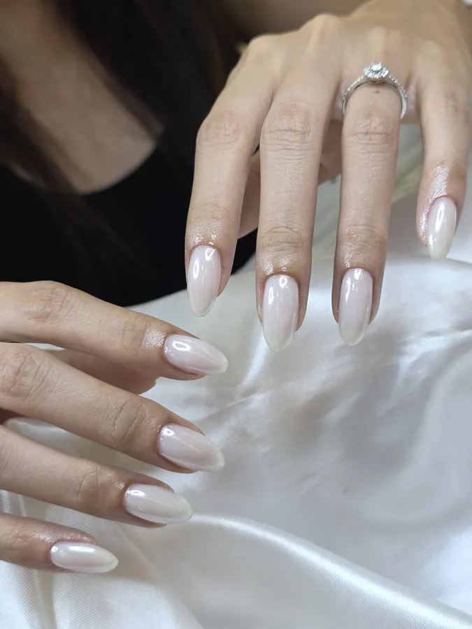 Pearly milky white nude almond nails, Nanny Nails, nail salon in Nakhon Phanom