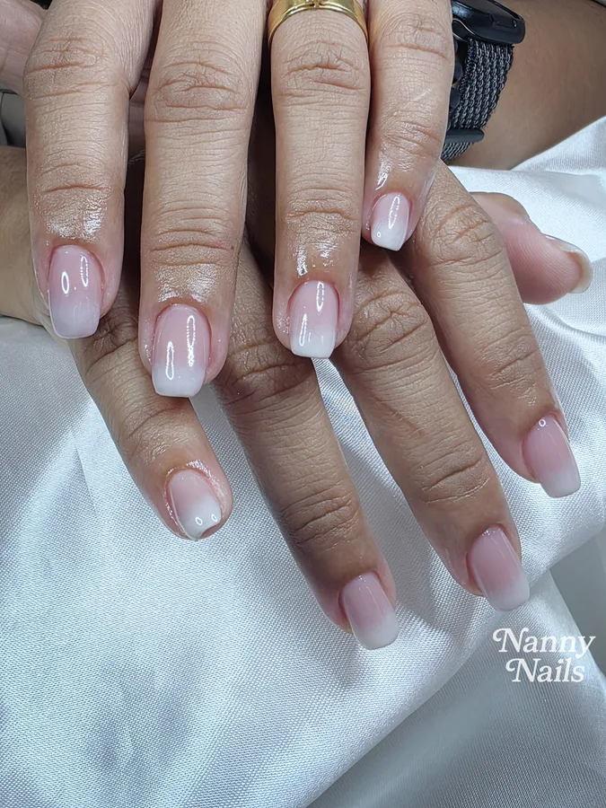 Ombre nails, soft pink fading to white tips on short nails, Nanny Nails, nail salon in Nakhon Phanom
