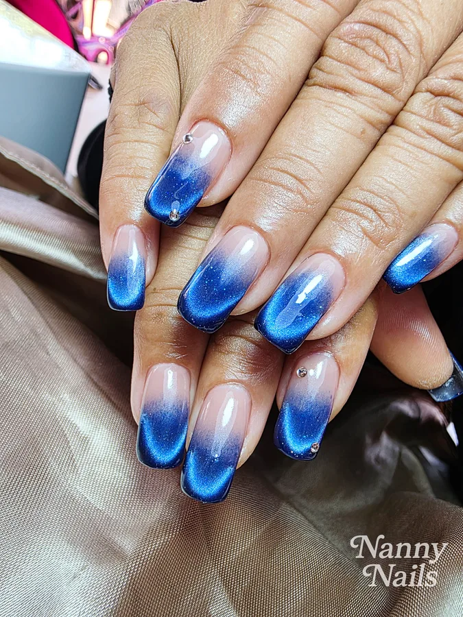 Cat eye ombre nails, deep blue fading at the tips, Nanny Nails, nail salon in Nakhon Phanom