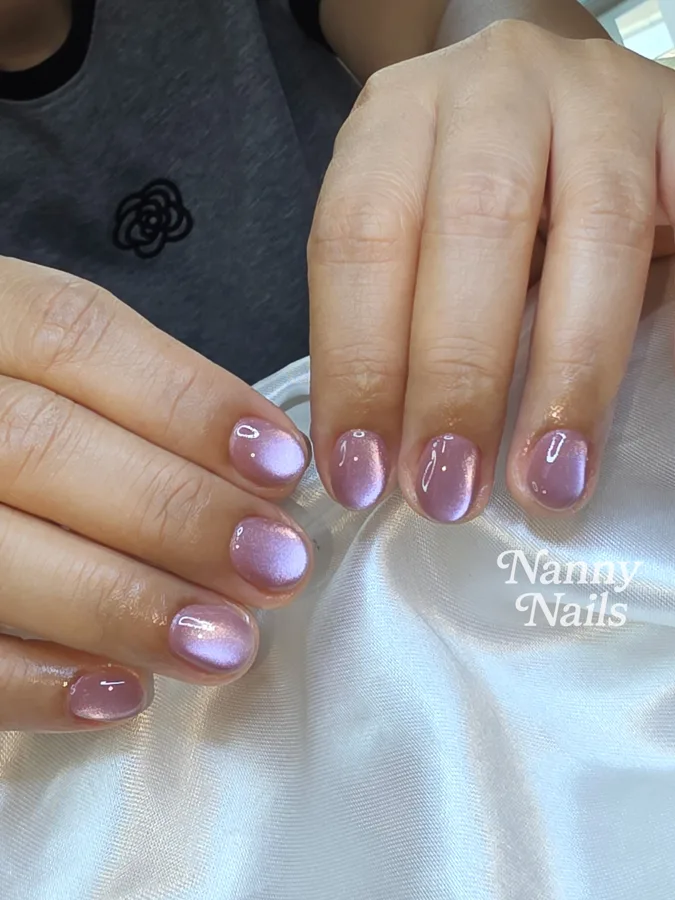 Mauve purple cat eye nails for a purple Thai dress, Nanny Nails, nail salon in Nakhon Phanom